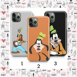 May include: Three phone cases featuring Goofy from Disney. The cases are in gray, orange, and black. Goofy is depicted in various poses, including playing a guitar and smiling. The background has a repeating pattern of tattoos and words.