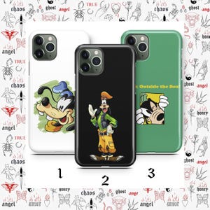May include: Three phone cases featuring cartoon characters. The first case is white with Goofy. The second case is black with Goofy. The third case is green with Mickey Mouse and the text "Outside the Box".