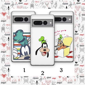 May include: Three white phone cases featuring Goofy from Disney cartoons. One case shows Goofy with a striped background, another has a close-up of his face, and the third has Goofy in a box. The background has tattoo-style illustrations.