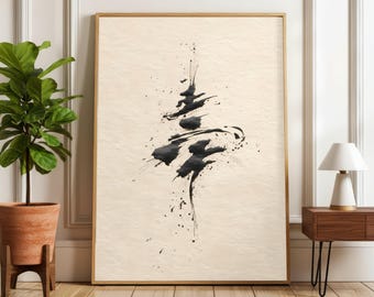Puede incluir: Pintura abstracta en tinta negra sobre fondo crema, enmarcada en madera clara. La obra presenta una composición dinámica con salpicaduras y pinceladas. La pieza se exhibe en una habitación bien iluminada con una planta en maceta y una mesa auxiliar.