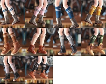 May include: Ten pairs of knee-high socks with contrasting stripes in various colors, paired with brown, black, and tan ankle boots.