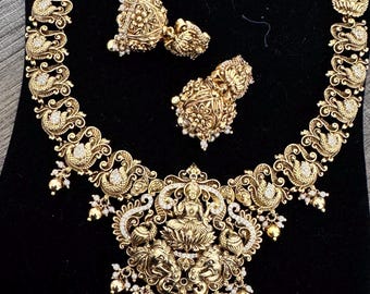 Antique gold finish white stone South Indian necklace/haram set with earrings
