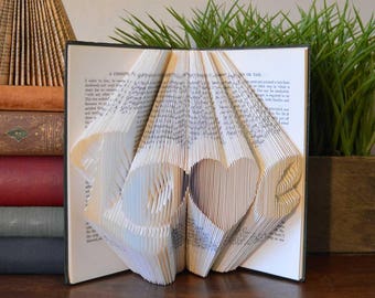 Folded Book Art with the Word Love