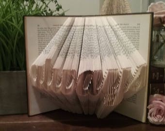 Folded Book with the Word Always