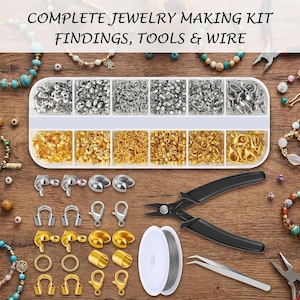 May include: A complete jewelry making kit featuring a white plastic organizer box with twelve compartments filled with silver and gold-toned findings, including jump rings, clasps, and crimp beads, alongside black pliers, tweezers, and wire.