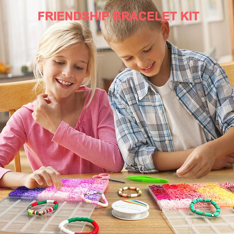 May include: A friendship bracelet kit with the text "FRIENDSHIP BRACELET KIT" at the top. The image shows two children smiling while making colorful bracelets. Various bracelets are displayed, along with beads, string, and tools.