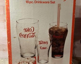 Vintage (1984) Coca-Cola 17-Piece drinkware set of 3 different sizes of “bell-shape” glasses