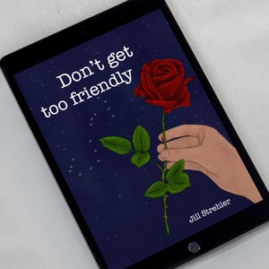 May include: A black tablet shows an illustration of a red rose held by a hand against a dark blue starry backdrop. The text "Don't get too friendly" is above the rose, with "Jill Strehler" below.