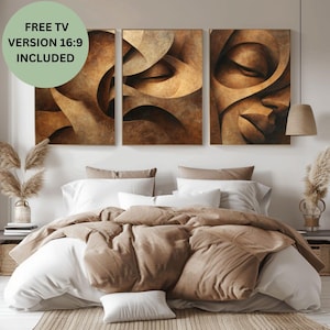 May include: Three abstract art prints in shades of brown and beige hang above a bed with white and tan bedding. The prints feature swirling, organic shapes. A green circle with the text "FREE TV VERSION 16:9 INCLUDED" is in the upper left corner.