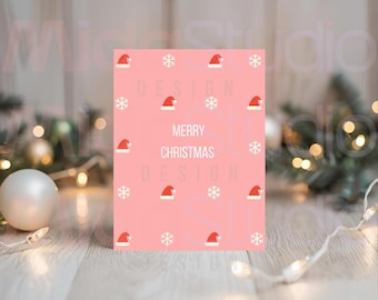 Tarjeta navideña rosa adorable para descargar en formato digital | Diseño de gorro de Papá Noel y copo de nieve | Imprimible para las fiestas