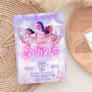May include: A birthday party invitation with a holographic design. The invitation features three animated figures holding confetti and a cake. The text reads "Emma's 5th Birthday" with the date and time. The invitation is on a white background.