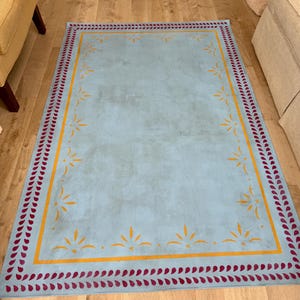 Beautiful hand painted floor cloth area rug