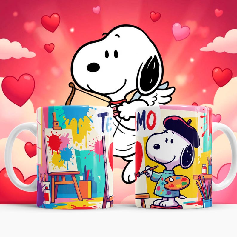 May include: Two white ceramic mugs featuring Snoopy illustrations. One mug shows Snoopy as an artist with a beret and palette, the other shows an art easel with paint splatters. The background is pink with hearts.