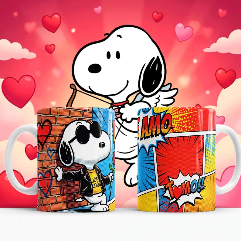May include: Two white ceramic mugs featuring Snoopy designs. One mug has Snoopy in sunglasses with the text "JOE COOL" and a brick wall background. The other mug has a comic book style design with the word "AMO". A Snoopy cupid is in the background.