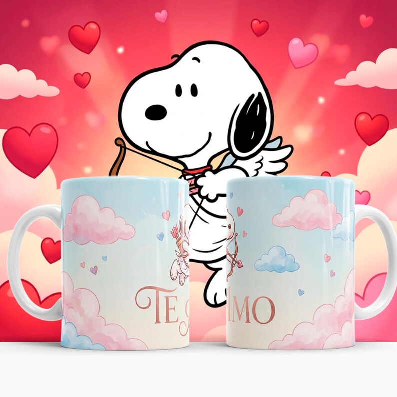 May include: Two white ceramic mugs with a light blue and pink cloud design, featuring Snoopy as Cupid with a bow and arrow. The mugs have the text "Te Amo" in a cursive font. Hearts float in the background.
