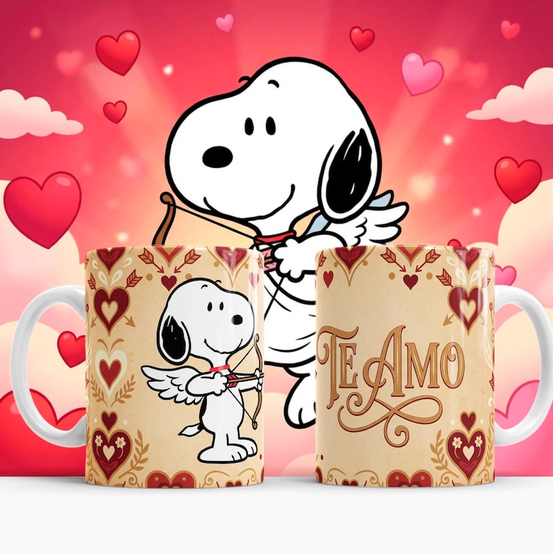 May include: Two white ceramic mugs with a Snoopy design. One mug features Snoopy as Cupid with a bow and arrow, the other mug has the words "Te Amo". The mugs have a cream background with red hearts and decorative elements.