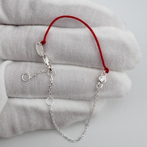 May include: A set of three ceramic mugs with a speckled, matte finish. The mugs are in shades of cream, light gray, and dark gray. Each mug has a simple, minimalist design, perfect for coffee or tea.