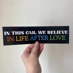 May include: A set of three ceramic mugs with a speckled, matte finish. Each mug features a different color: light blue, cream, and gray. The mugs have a simple, modern design and a comfortable handle.