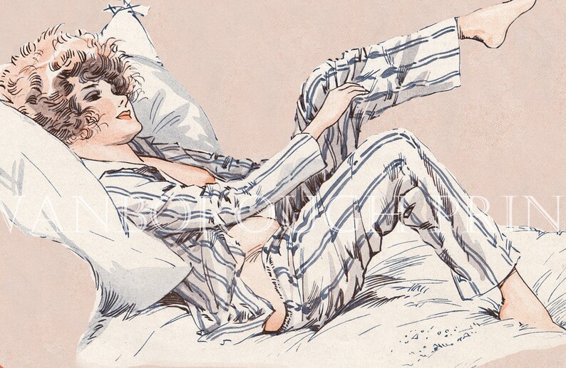 May include: A woman in striped pyjamas lies on a bed with a pillow behind her head. She is looking to the side with her legs raised and one hand holding the pyjama leg.