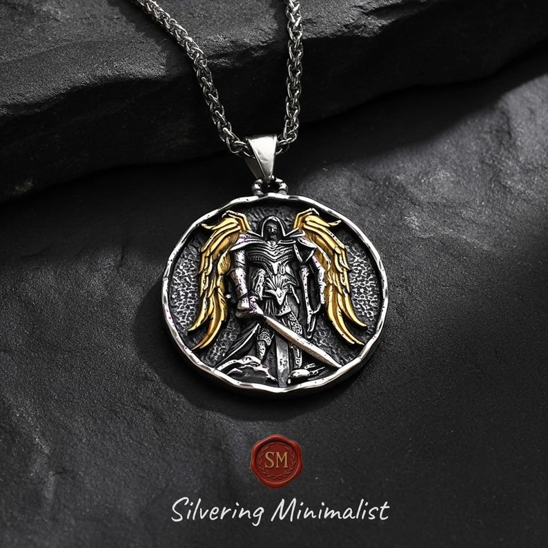 Close detail of st michael necklace with 3mm wheat chain and sturdy bail, 316L stainless steel christian necklace designed as durable catholic jewelry.