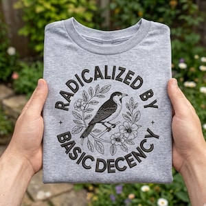 May include: A set of three ceramic nesting bowls in shades of blue, green, and white. The bowls feature a speckled glaze and a simple, modern design. The largest bowl measures approximately 6 inches in diameter.