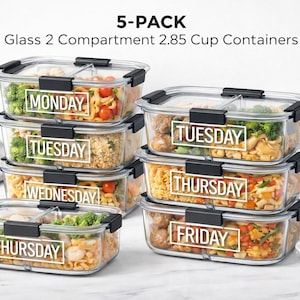 May include: A set of five glass food containers with black lids and dividers, each labelled with a day of the week. The containers are filled with food. A white water bottle is on the right. Each container holds 675 ml.
