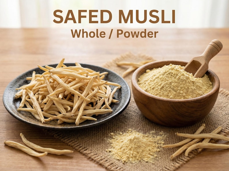May include: Image of Safed Musli, whole and powder form. A dark plate holds whole Safed Musli, while a wooden bowl contains the powder. A wooden scoop rests in the bowl. The text "SAFED MUSLI Whole / Powder" is at the top.