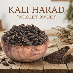 May include: A wooden bowl filled with dark brown Kali Harad fruit, with a wooden scoop and a pile of powder next to it. The text "KALI HARAD {WHOLE/POWDER}" is displayed above the bowl. The scene is set on a wooden table.