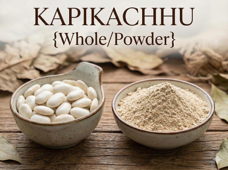 May include: Two ceramic bowls on a wooden surface. One bowl contains white beans, the other contains a light brown powder. The text "KAPIKACHHU {Whole/Powder}" is at the top of the image.