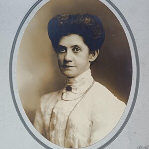 Large, vintage, oval-shaped photo of a Victorian lady on board by Wright & Co. Oldham/Blackburn
