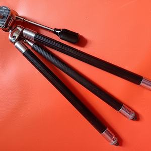 Vintage camera tripod in case
