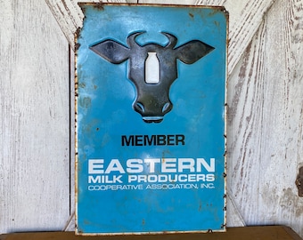 Dairy Farm Sign Eastern Milk Producers Holstein Cow embossed 1970s 12 x 18 tin tacker
