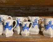 Set of 6 Flow Blue Ironstone Pitchers w Delft or Holland Scene Antique early 1900s