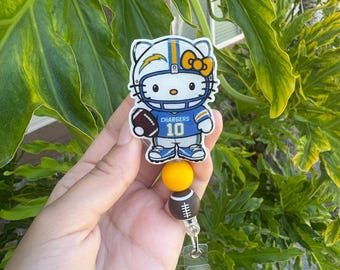 Handmade Football Cat Badge Reel | Shrink Plastic, Resin Coated (Alligator Clip)