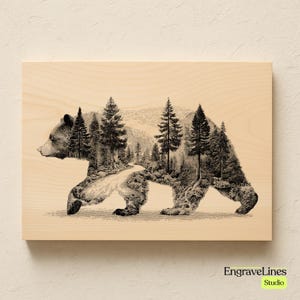 May include: A wooden art piece featuring a walking bear silhouette filled with a forest scene. The bear is in shades of brown and black, with a detailed depiction of trees, a road, and mountains. The background is a light wood grain.