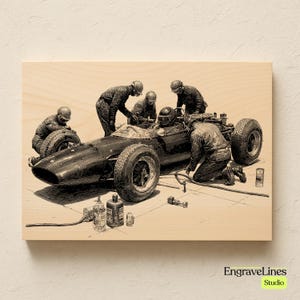 May include: A black and white illustration on wood of a vintage race car being worked on by a team of mechanics. The image features the text "EngraveLines Studio". The car has large tires and is surrounded by tools and equipment.