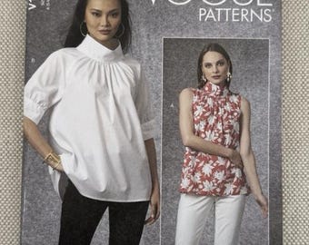 Vogue V1701 - Haut avec col montant et options de manches, de petite à XXL