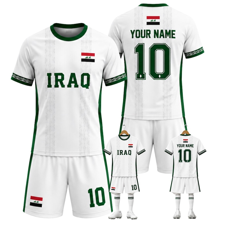 May include: White soccer uniform with green trim, featuring the word "IRAQ" and the number "10" in green. The uniform includes the Iraqi flag and is displayed on a mannequin and a smaller version on a hanger.