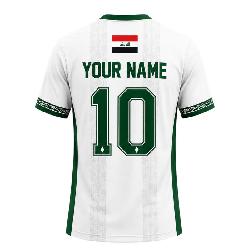 May include: White soccer jersey with green accents, featuring the number 10 and the text "YOUR NAME" in green. The Iraqi flag is displayed above the text. The sleeves have a green and white geometric pattern.