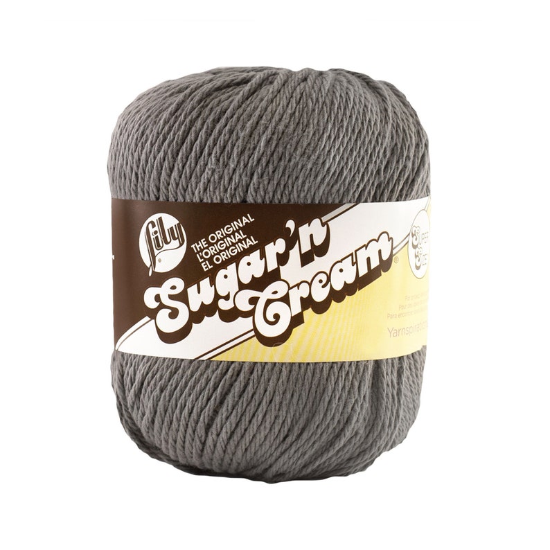 May include: A skein of gray Sugar'n Cream yarn by Lily. The original, l'original, el original.