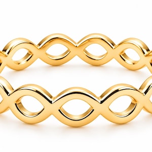 May include: A polished yellow gold ring featuring a continuous band of interconnected circular loops. The design consists of a repeating pattern of open, rounded links that form a symmetrical, chain-like structure around the entire circumference.