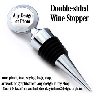 May include: Double-sided wine stopper with a silver finish and a black rubber stopper. The stopper has a round, silver top with a clear circle in the center that says "Any Design or Photo".