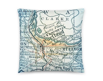 May include: Vintage map pillow featuring a detailed map of the Portland, Oregon area. The map shows the city's major streets, neighborhoods, and landmarks. The pillow is made of soft, durable fabric and is perfect for adding a touch of vintage charm to any room.