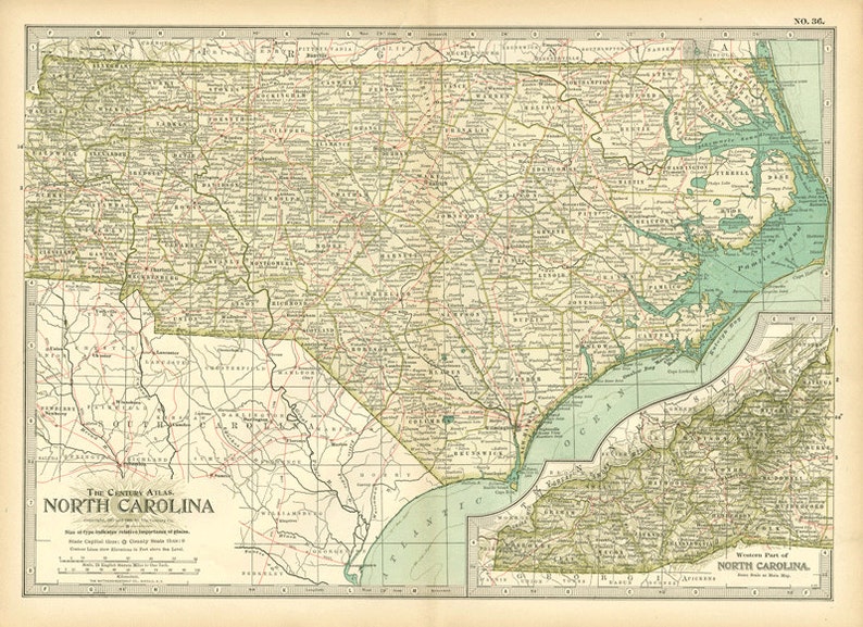 May include: A vintage map of North Carolina, showing the state's counties and major cities. The map is printed in shades of green, brown, and blue, with a light blue border. The map is titled "The Century Atlas, North Carolina".