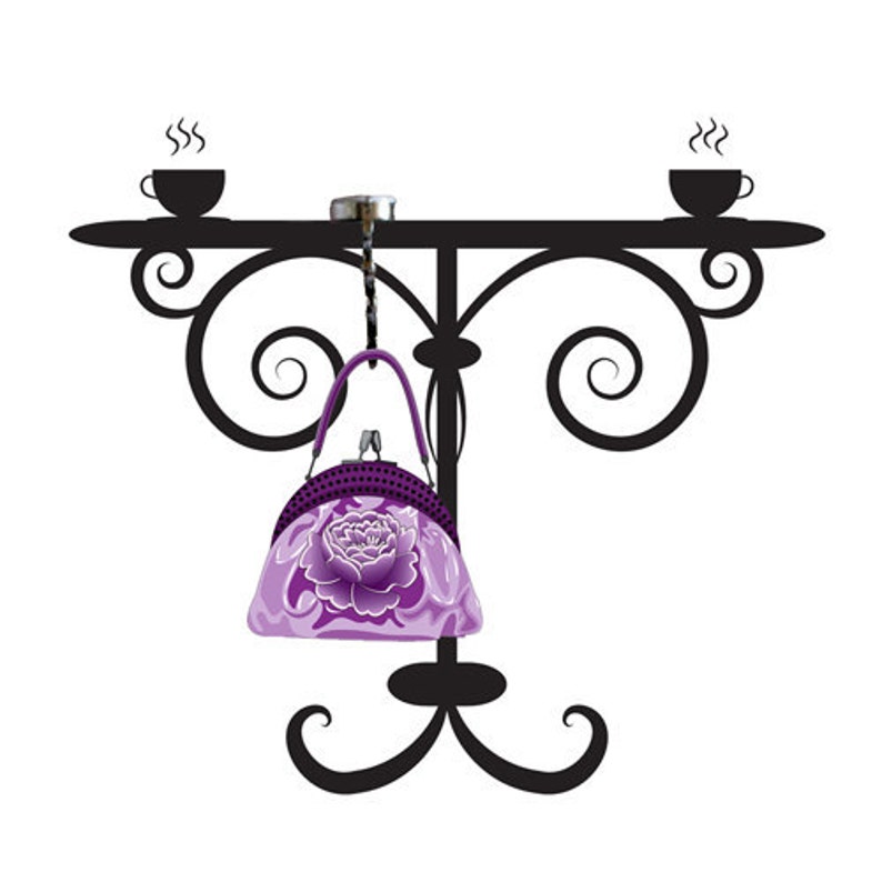 May include: A black metal stand with two cups and a purple floral purse hanging from it.