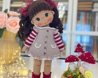 Muñeca amigurumi de crochet hecha a mano: pelo rizado, decoración infantil