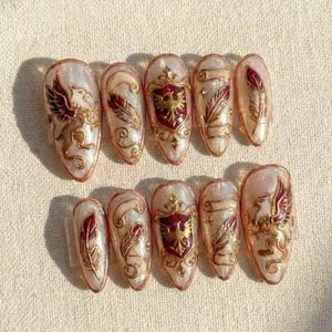 May include: A white ceramic mug with a black handle and the text "But First, Coffee" in a black, bold font. The mug is on a white surface. The mug is approximately 4 inches tall.