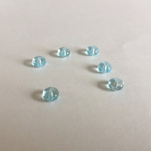 50 pieces of  4x7mm gemstone cut  fire polished  rondelle in transparent Light Blue with Glitter effect glass bead G1 01440600000