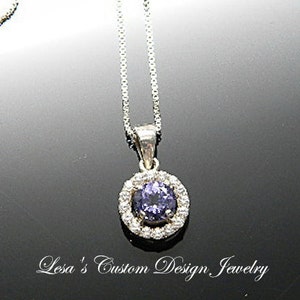 Diamond cut Tanzanite Cubic Zirconia Sterling Silver halo Pendant