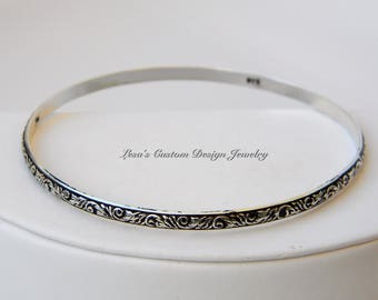 Scroll leaf patterned sterling silver bangle bracelet